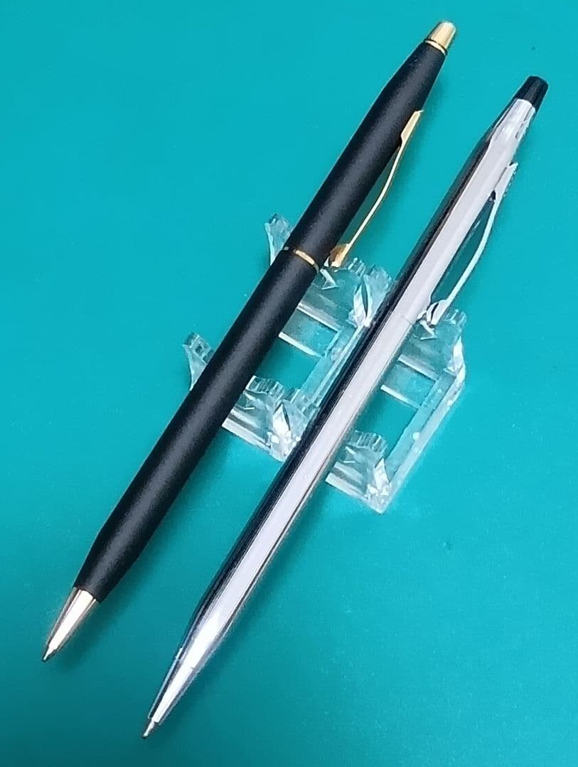 Set of two CROSS Classic Century vintage twist ballpoint pens in matte black and silver chrome colors