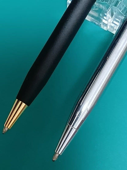 Set of two CROSS Classic Century vintage twist ballpoint pens in matte black and silver chrome colors