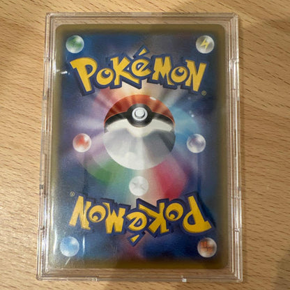 Satoshi's Pikachu Promo Card 075/SM-P in mint condition with no white scratches