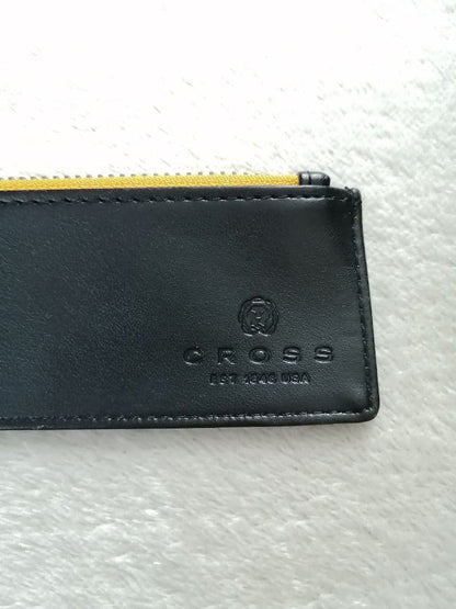 Cross brand leather pen case in used condition with visible scratches and stains