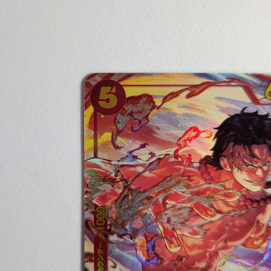 One Piece Portgas D Ace SEC collectible card from Japanese import with protective sleeve