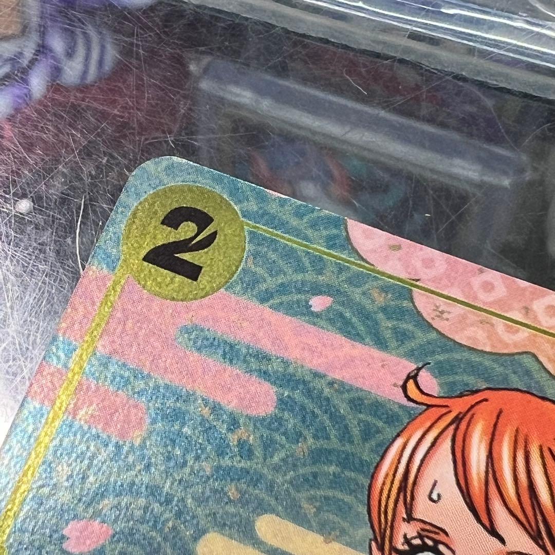 One Piece Card Game Nami R OP06-101 Japanese promotion card from 2nd Anniversary Complete Guide set