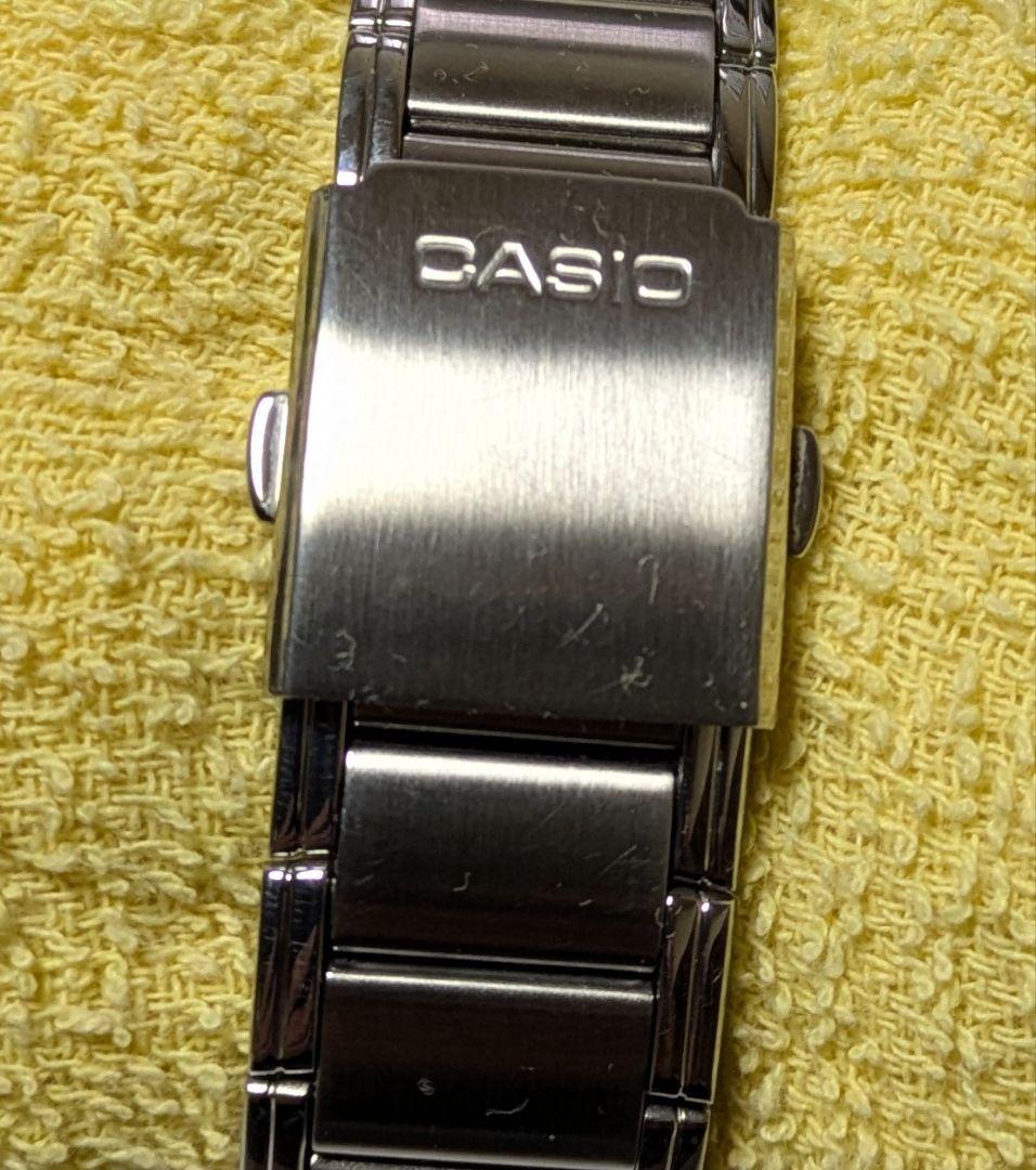 Casio RS100 Solar Watch with Navy Dial and Yellow Arrow Hands