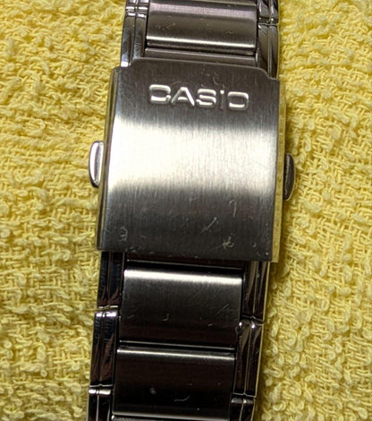 Casio RS100 Solar Watch with Navy Dial and Yellow Arrow Hands
