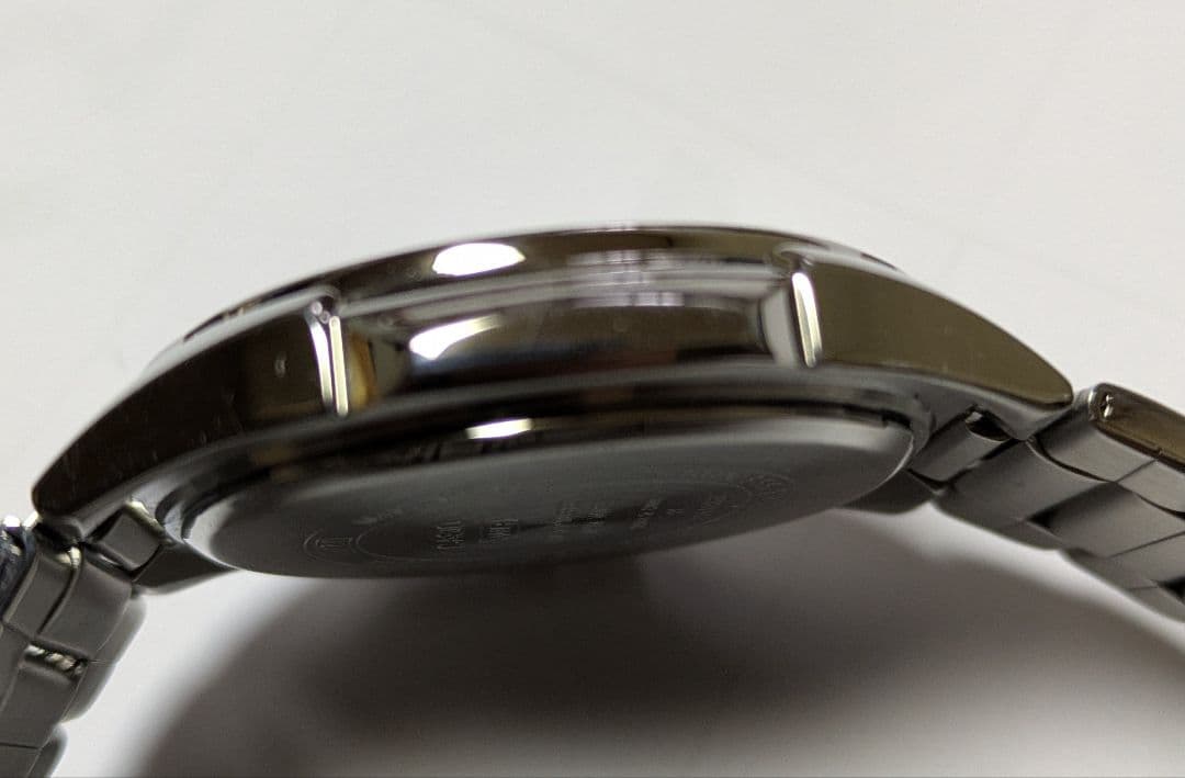 Casio RS100 Solar Watch with Navy Dial and Yellow Arrow Hands