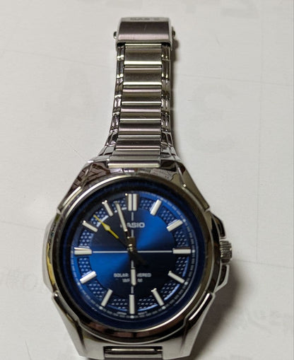 Casio RS100 Solar Watch with Navy Dial and Yellow Arrow Hands