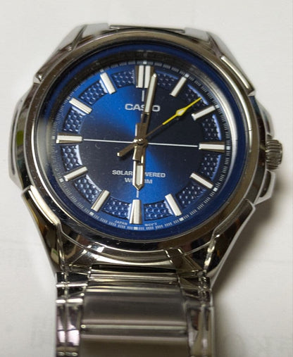 Casio RS100 Solar Watch with Navy Dial and Yellow Arrow Hands