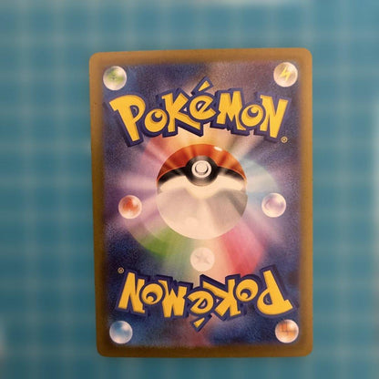 Used Bandai Mega Charizard X EX SAR 110/080 card with darkened spots and surface scratches