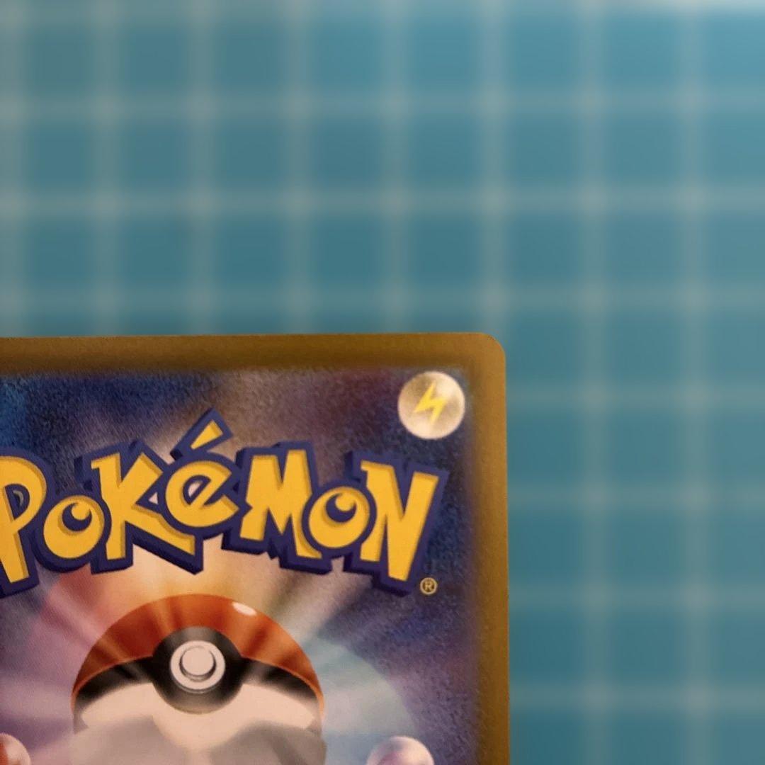 Used Bandai Mega Charizard X EX SAR 110/080 card with darkened spots and surface scratches