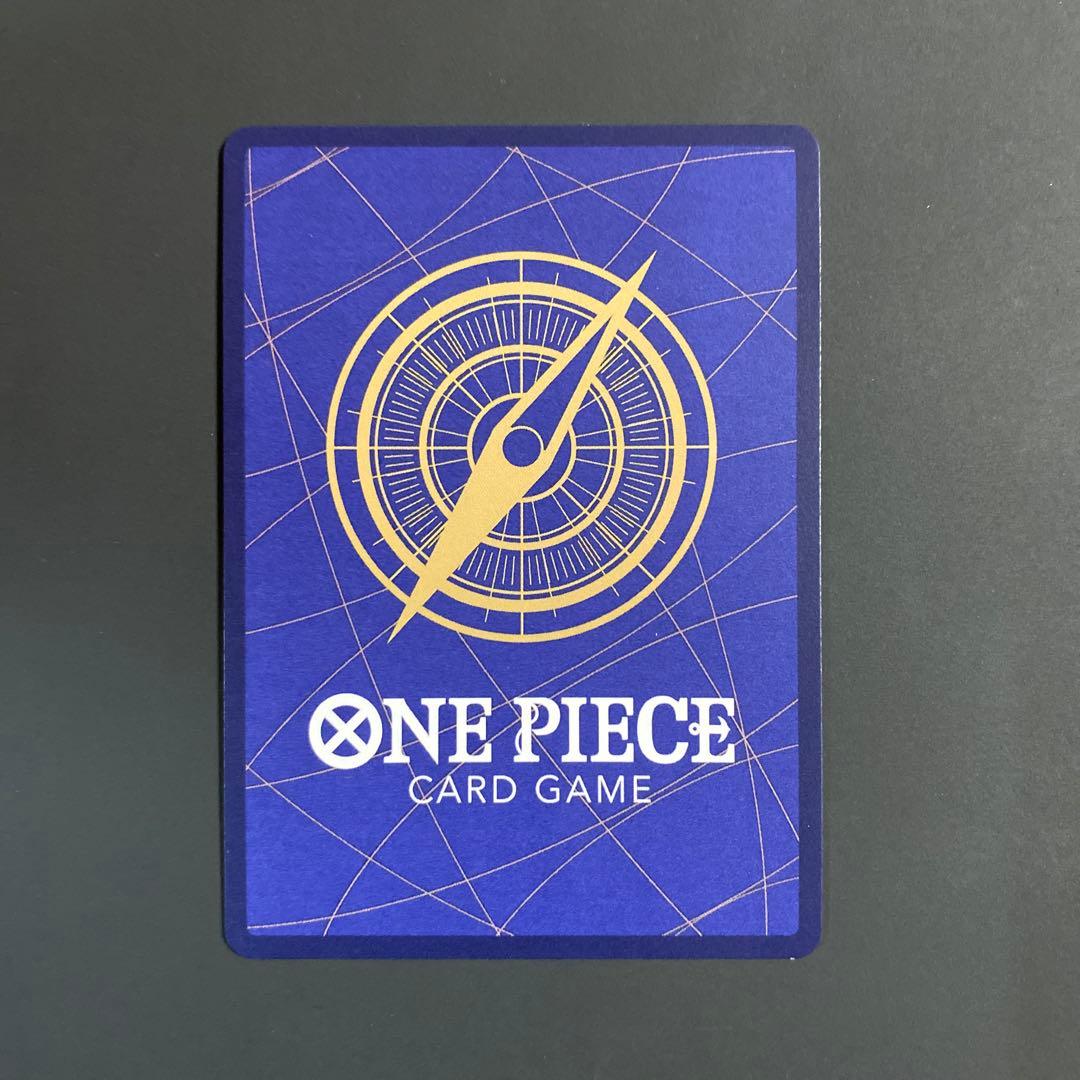 One Piece Card Game Utah ShikPar card displayed with protective sleeve in a clean, organized setup