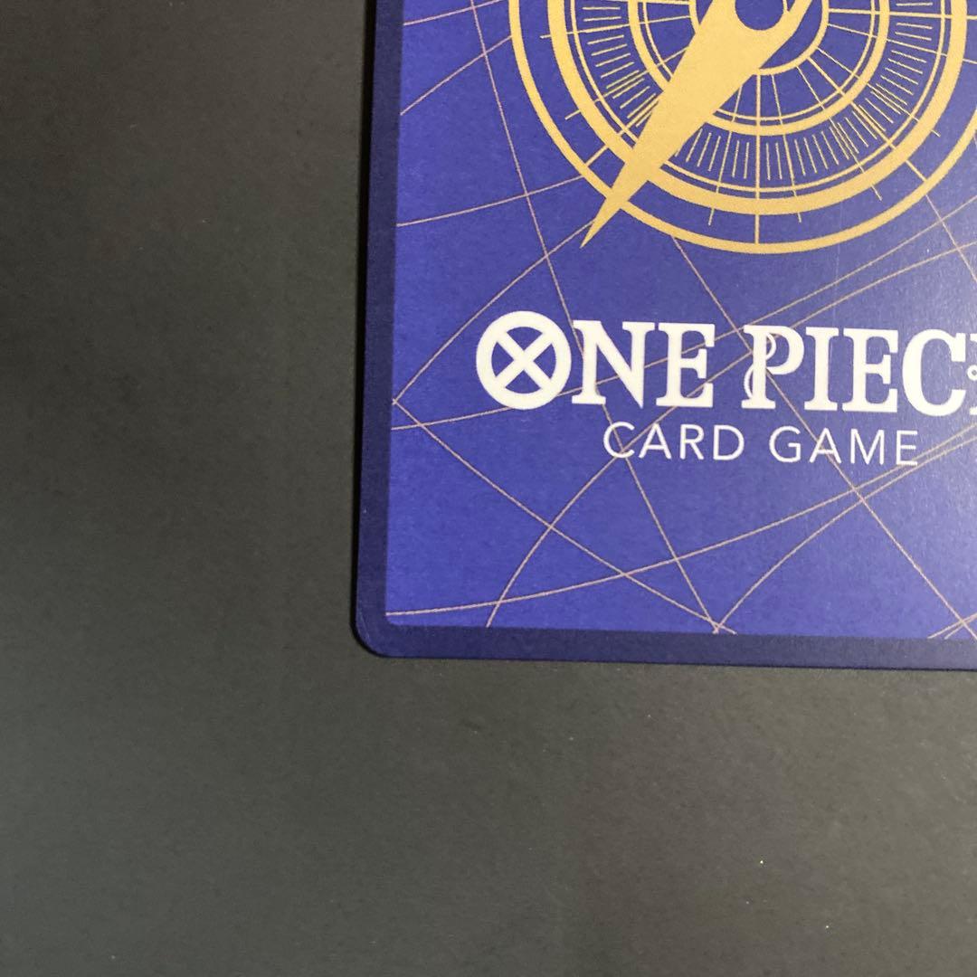 One Piece Card Game Utah ShikPar card displayed with protective sleeve in a clean, organized setup