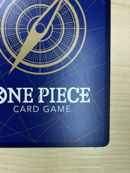 One Piece Monster D. Luffy 1st Anniversary Promo English version card with visible surface wear and white fade on the back