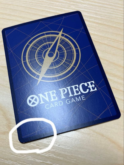 One Piece Monster D. Luffy 1st Anniversary Promo English version card with visible surface wear and white fade on the back