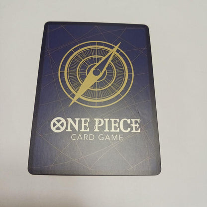 One Piece Monkey D. Luffy P-043 card showing Luffy wearing a crown sitting in a treasure chest