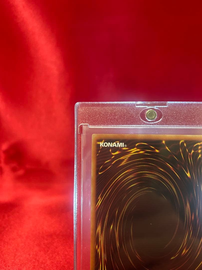 Yu-Gi-Oh Black Magician reprint card in sleeve and hard protective case