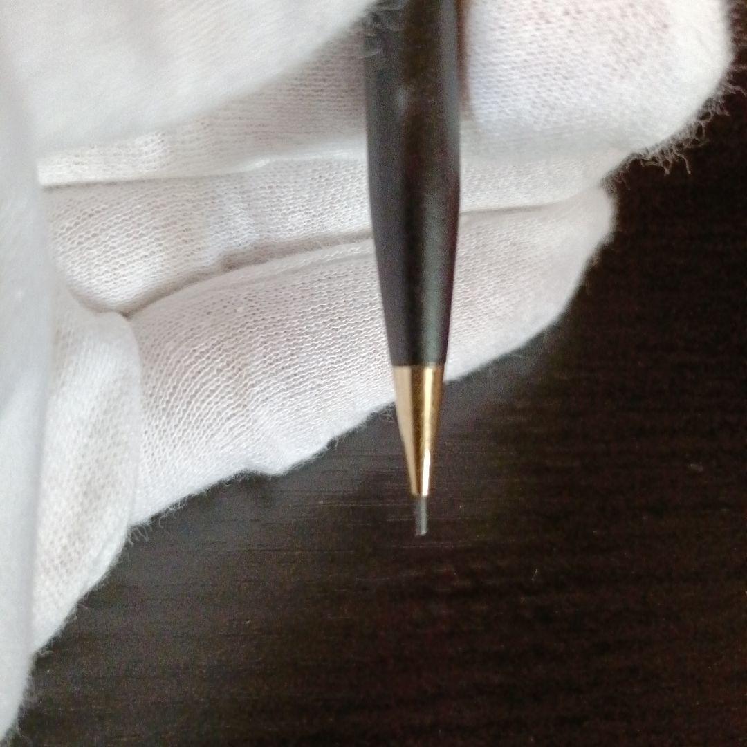 Cross twist ballpoint pen and mechanical pencil set in matte black with gold accents and shell logo
