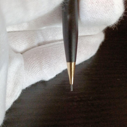 Cross twist ballpoint pen and mechanical pencil set in matte black with gold accents and shell logo