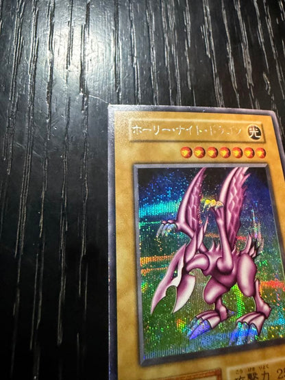 Bandai Yu-Gi-Oh Holy Knight Dragon Secret Rare Early Edition card showing front with minor edge wear