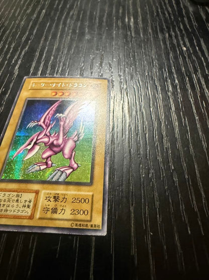 Bandai Yu-Gi-Oh Holy Knight Dragon Secret Rare Early Edition card showing front with minor edge wear