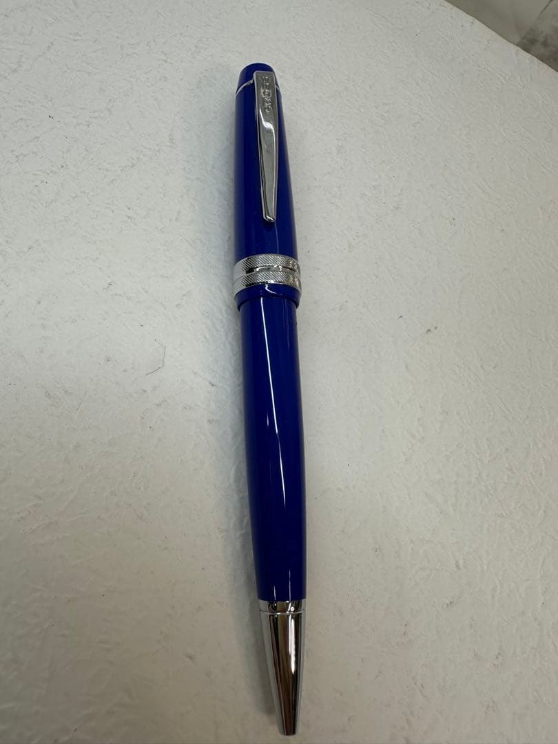 Used CROSS ballpoint pen with blue body, silver accents, and dedicated case
