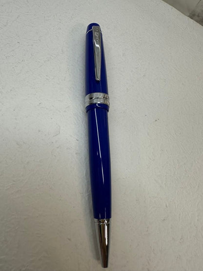 Used CROSS ballpoint pen with blue body, silver accents, and dedicated case
