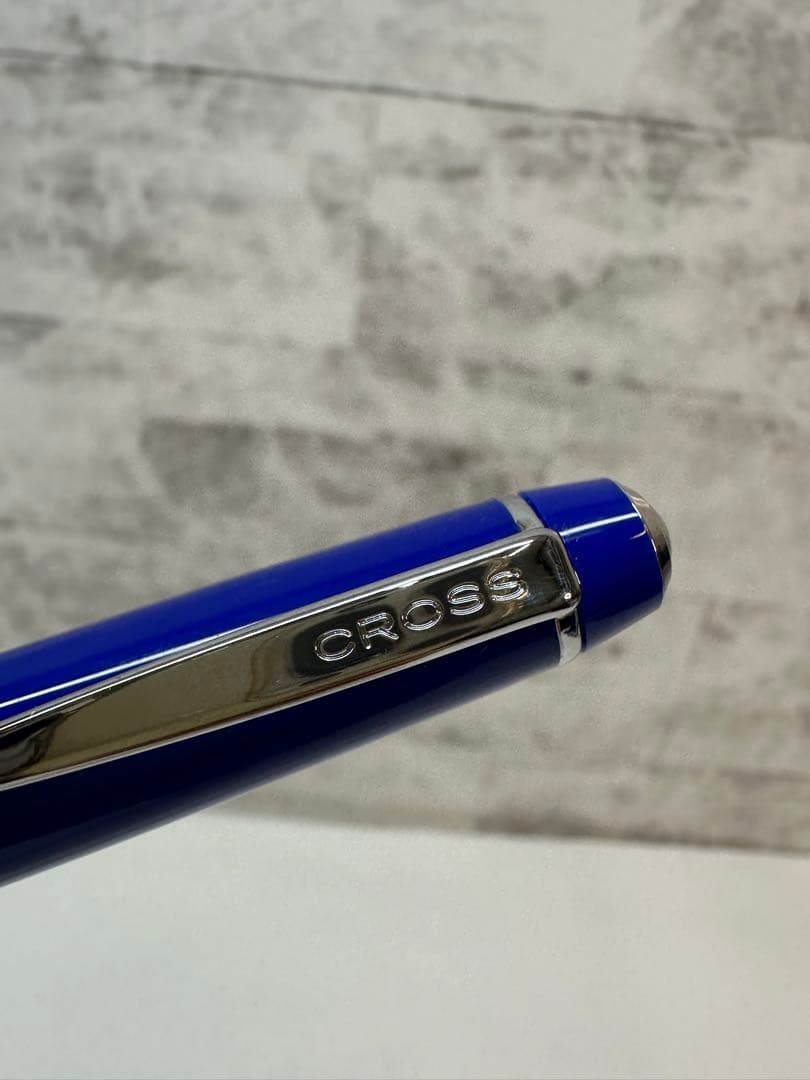 Used CROSS ballpoint pen with blue body, silver accents, and dedicated case