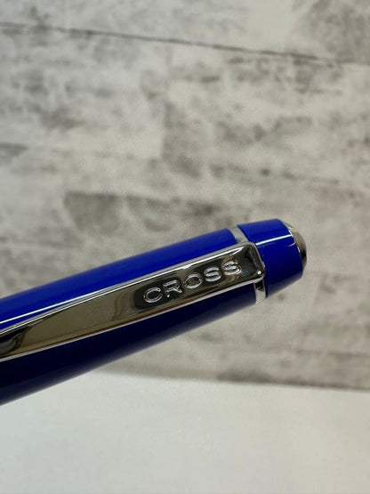 Used CROSS ballpoint pen with blue body, silver accents, and dedicated case
