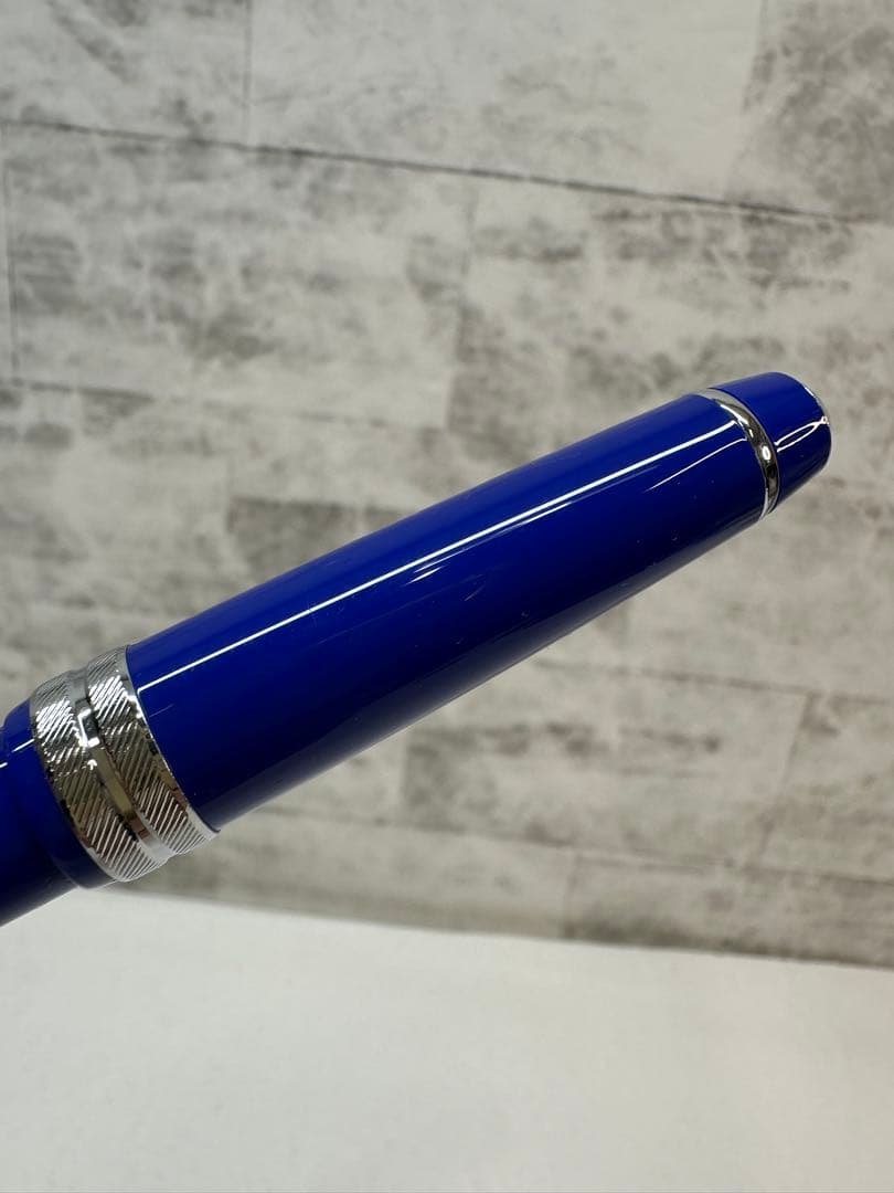 Used CROSS ballpoint pen with blue body, silver accents, and dedicated case