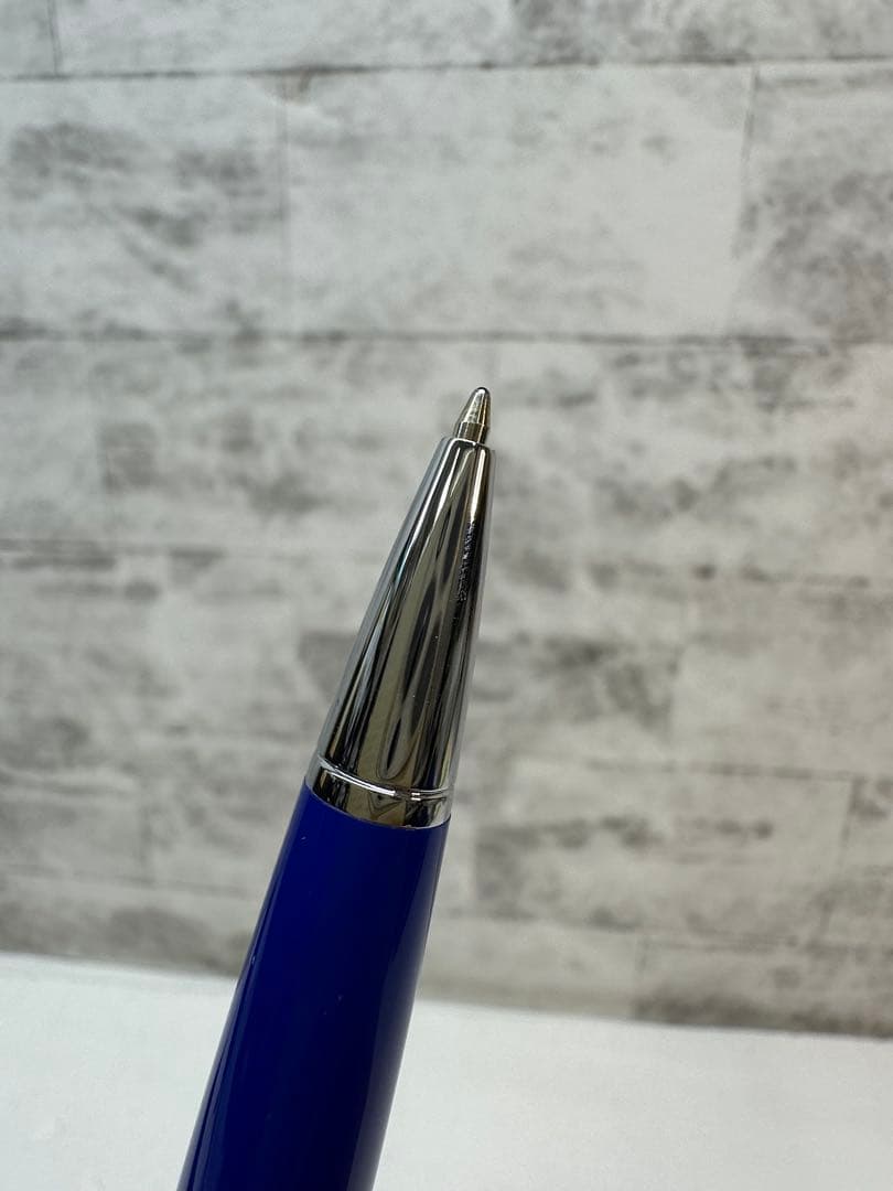 Used CROSS ballpoint pen with blue body, silver accents, and dedicated case