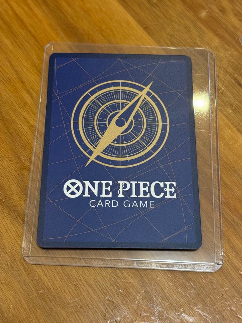One Piece Nami P-053 Promo Parallel trading card in sleeve and loader from the One Piece card game
