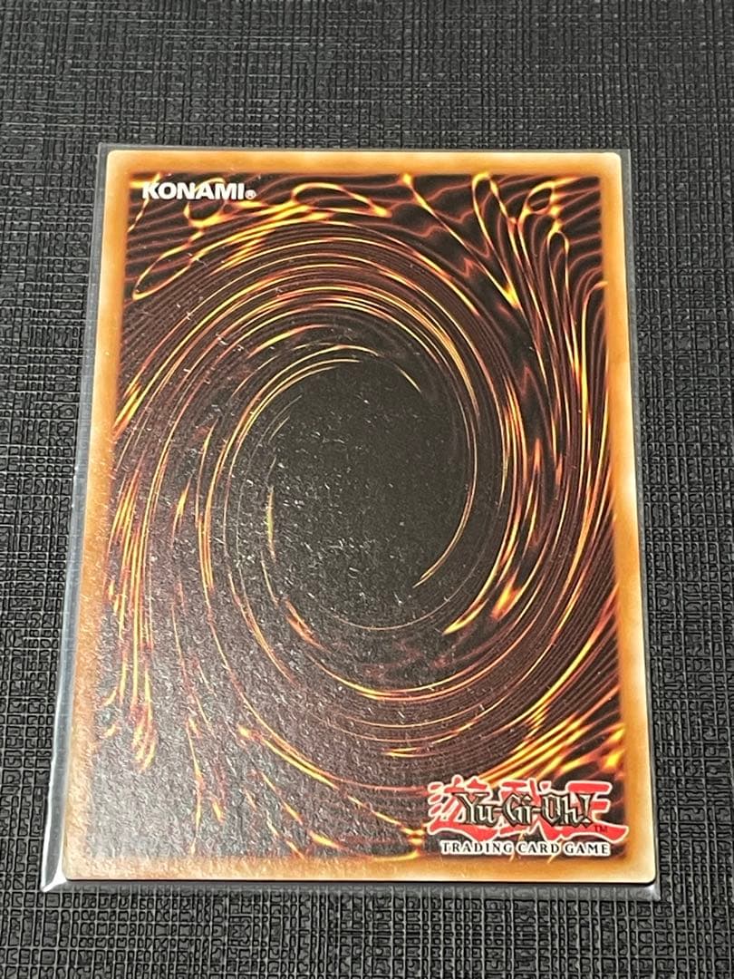 Sony Dark Armed Dragon Ghost Rare Yu-Gi-Oh trading card with visible overseas scratch marks