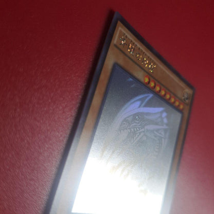 Yugi-Two Blue-Eyes White Dragon holographic rare trading card from TRC set with fine scratches