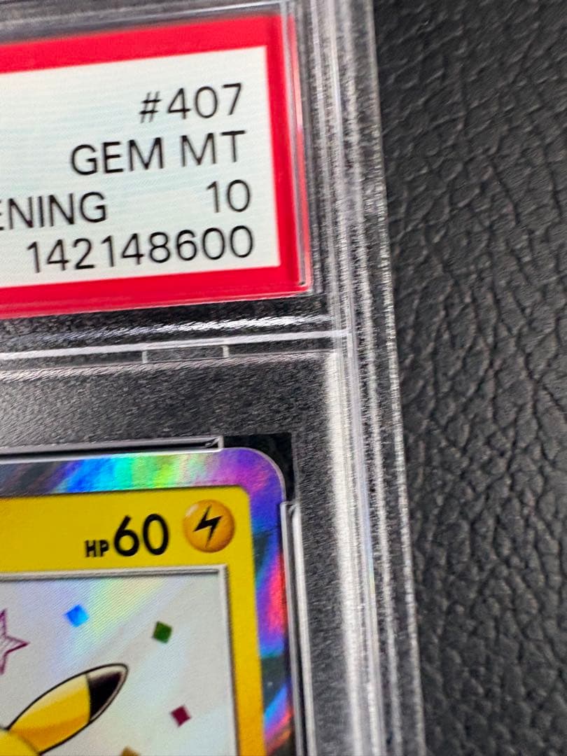 Mutsuba Guest Pikachu Promo Card PSA10 graded trading card with visible surface and scratches
