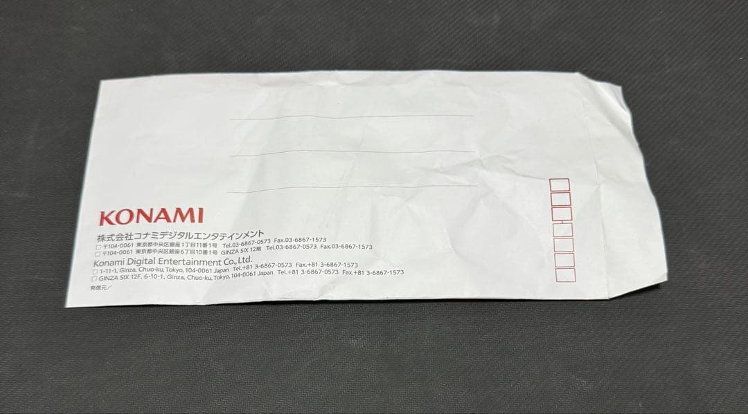 Unopened Yu-Gi-Oh Red-Eyes Burgundy Eye of the Black Dragon Prismatic Secret card with seal envelope
