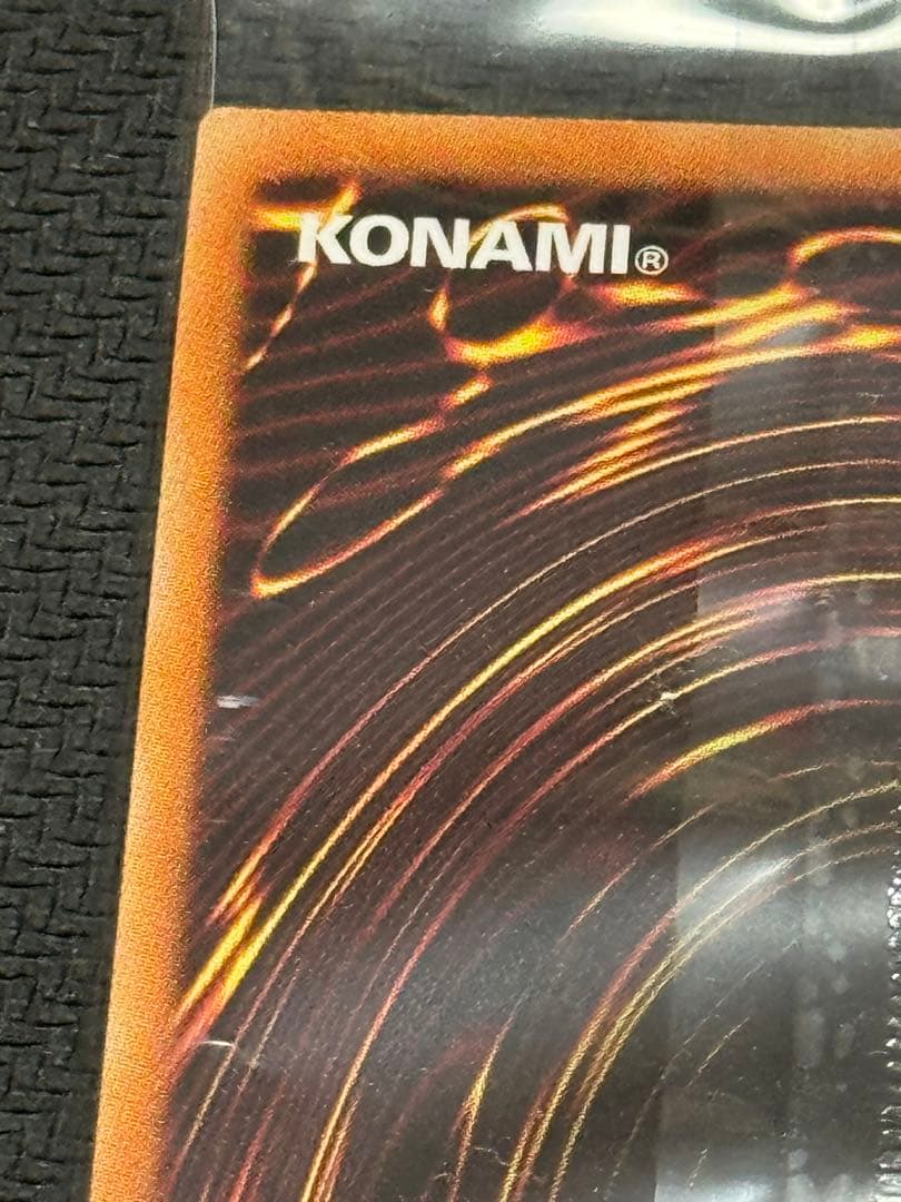 Unopened Yu-Gi-Oh Red-Eyes Burgundy Eye of the Black Dragon Prismatic Secret card with seal envelope