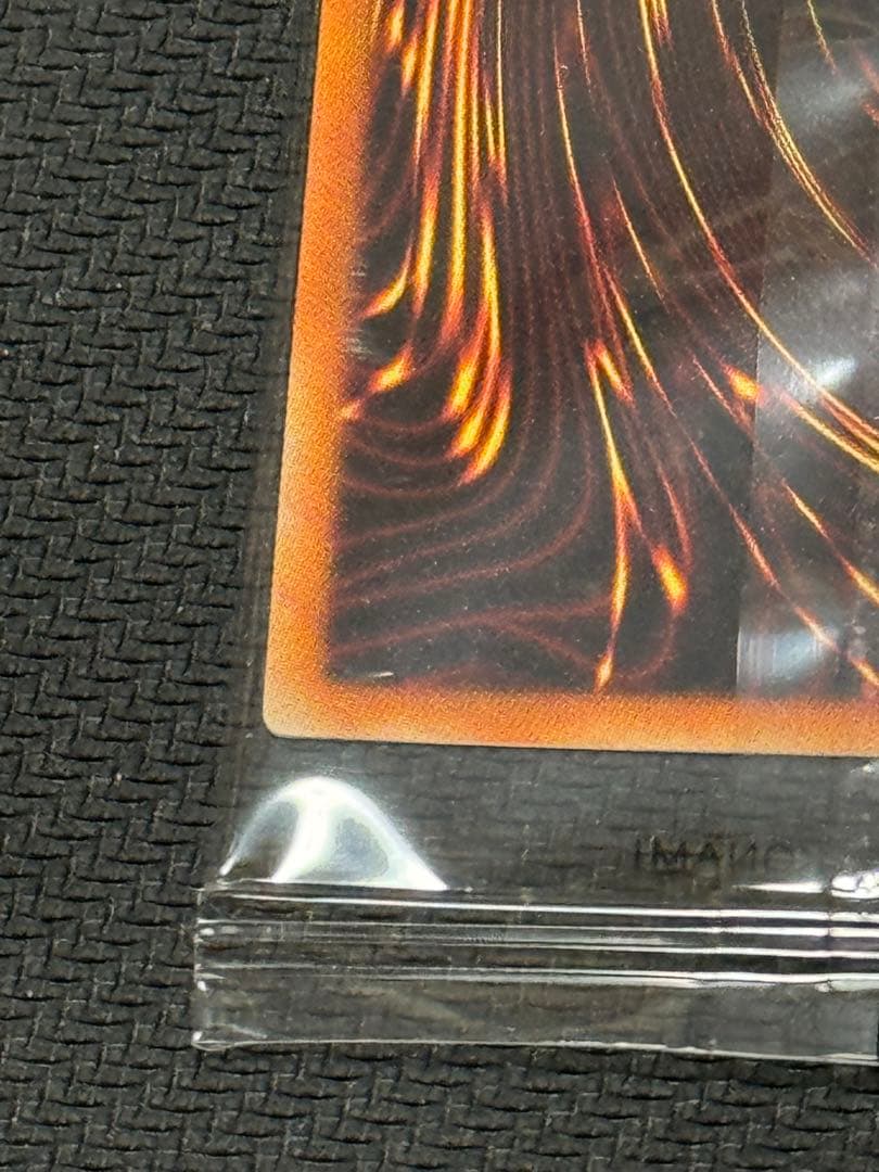Unopened Yu-Gi-Oh Red-Eyes Burgundy Eye of the Black Dragon Prismatic Secret card with seal envelope