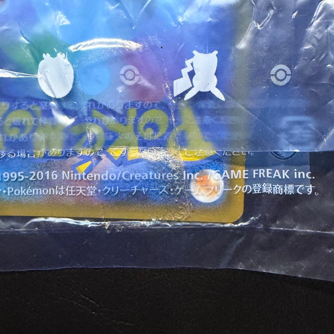 Unopened Yokohama Pikachu 283/SM-P promotional card in protective sleeve with no visible damage