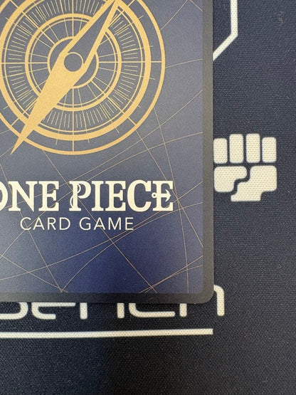 One Piece Card Game Gum-Gum Golden Rotation Bullet Parallel OP05-116 R card with visible white cracks from initial scratches