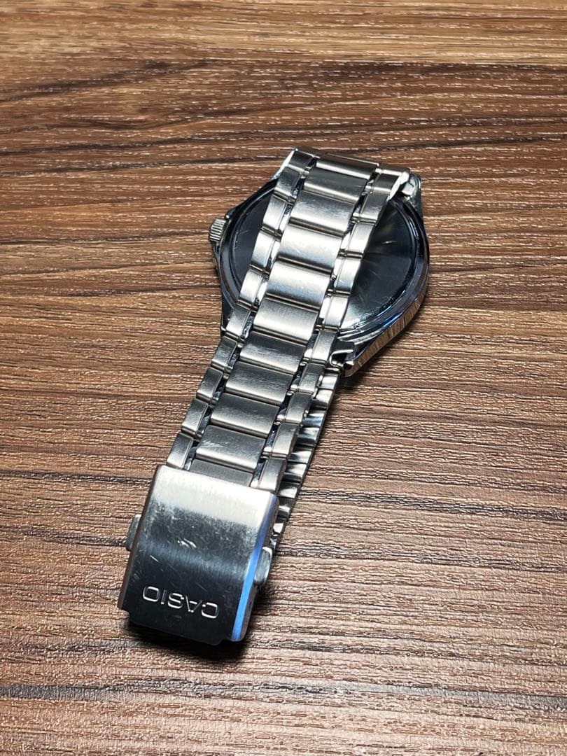 Casio MTP-1239DJ Quartz Watch with Day Date and Silver Sunray Dial — Japan Import