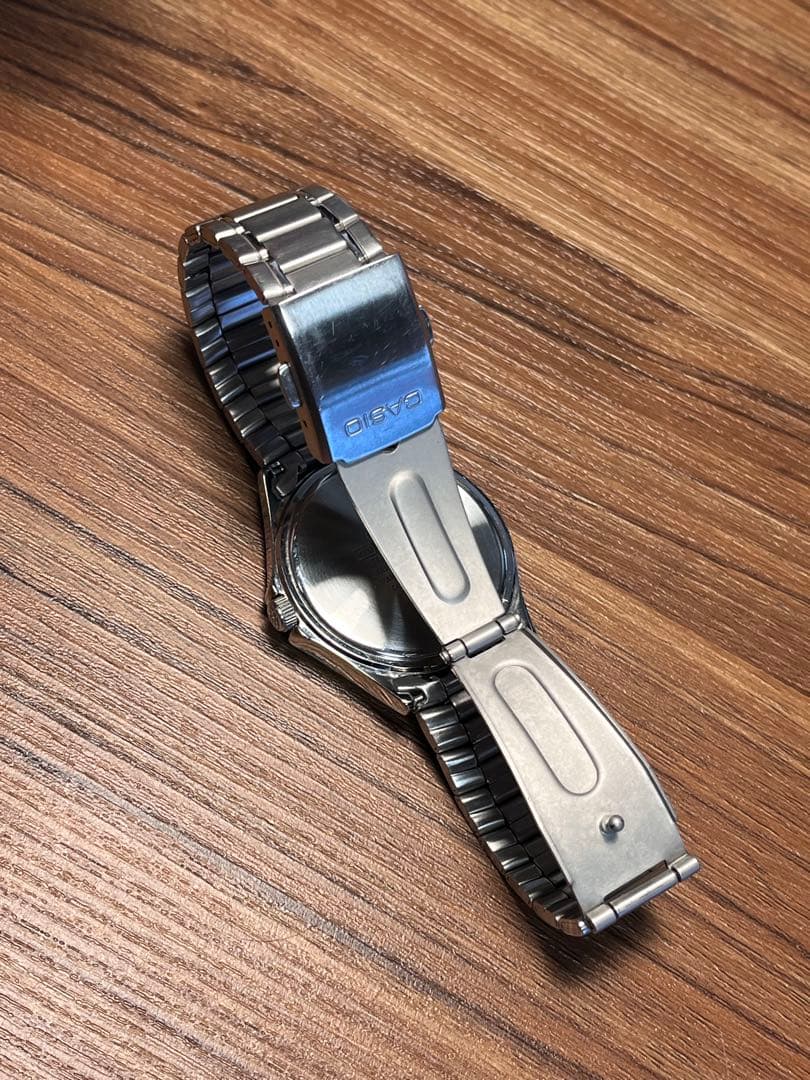 Casio MTP-1239DJ Quartz Watch with Day Date and Silver Sunray Dial — Japan Import