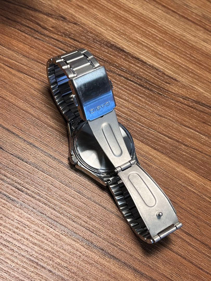 Casio MTP-1239DJ Quartz Watch with Day Date and Silver Sunray Dial — Japan Import