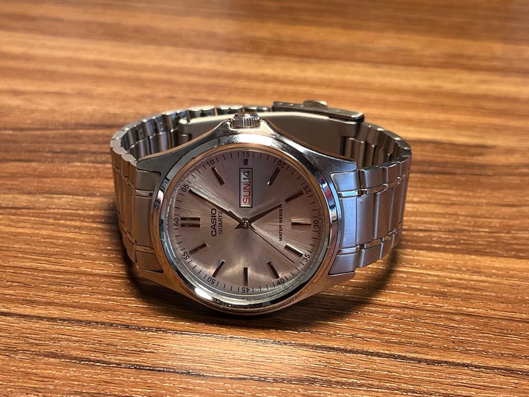 Casio MTP-1239DJ Quartz Watch with Day Date and Silver Sunray Dial — Japan Import