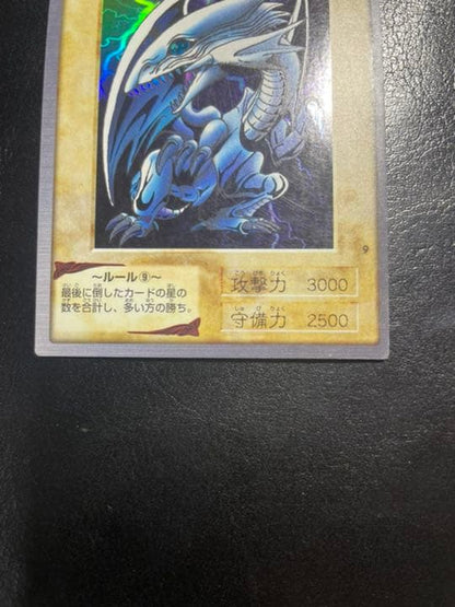 Bandai Carddass foil embossed Blue-Eyes White Dragon collectible card from the initial series, Japan import