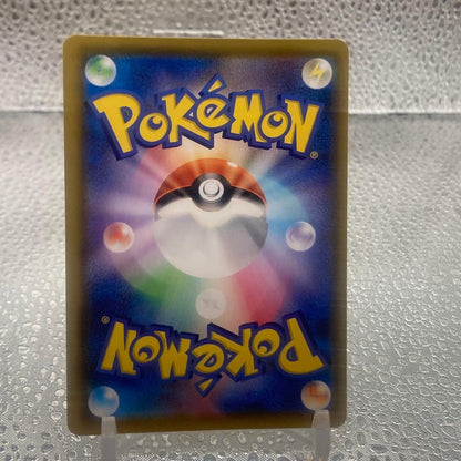Limited edition Mew UR 25th Anniversary Pokemon collectible card with gold finish and logo collage from Japan