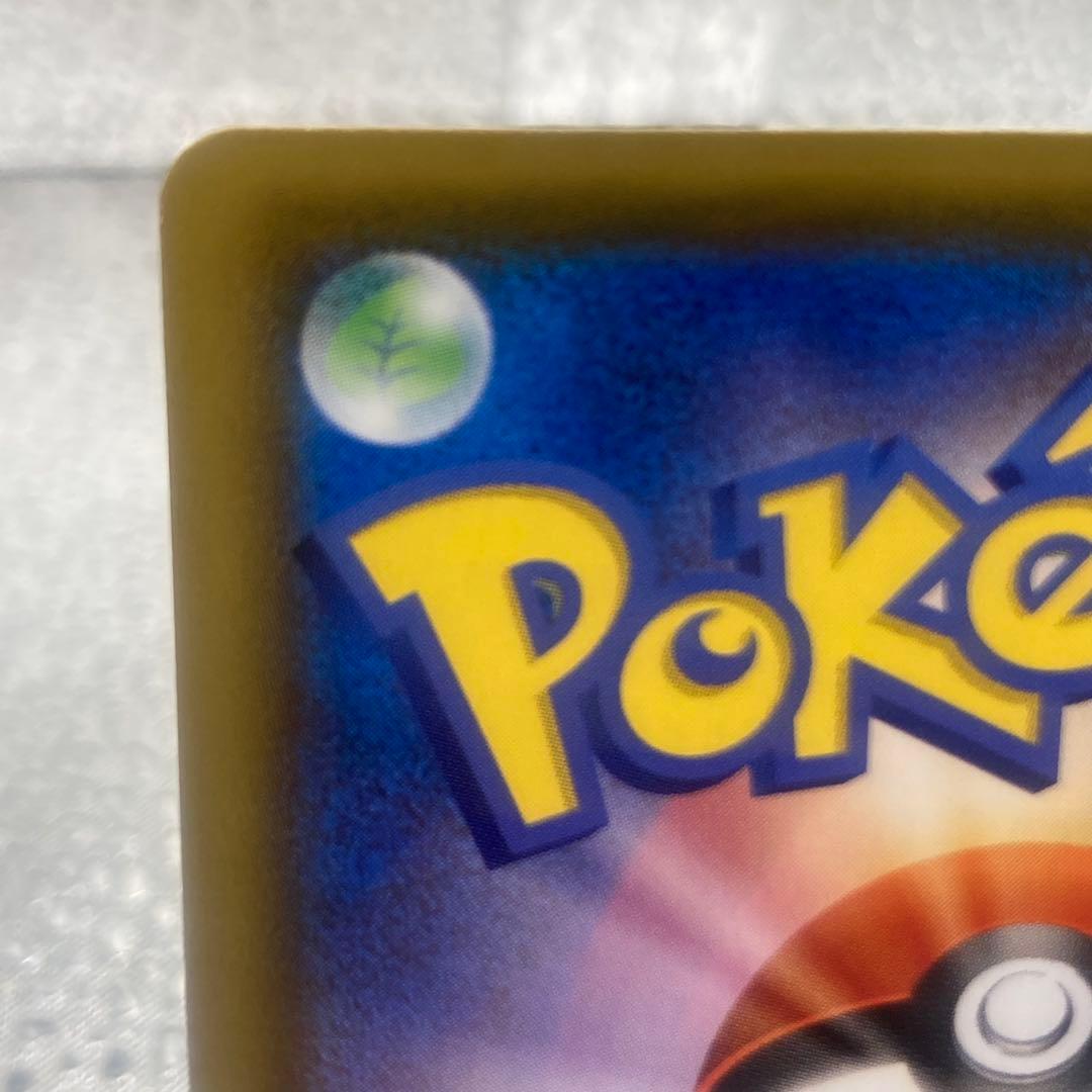 Limited edition Mew UR 25th Anniversary Pokemon collectible card with gold finish and logo collage from Japan