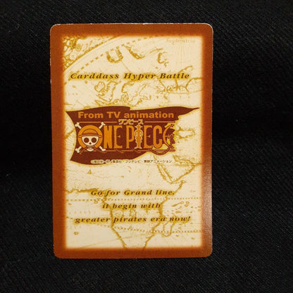 Vintage One Piece collectible card with minor scratches and chips shown in photo