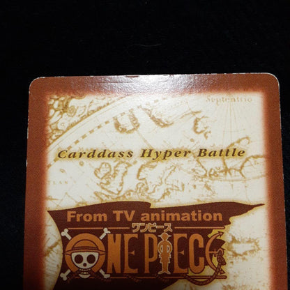 Vintage One Piece collectible card with minor scratches and chips shown in photo
