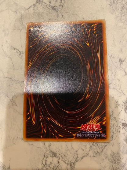 Yu-Gi-Oh! Blue-Eyes White Dragon Initial Edition Monster Card from Duel Monsters series in amateur storage