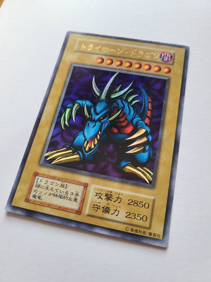 Bandai Trihorn Dragon Card showing dark attribute, level 7 monster with 2850 attack and 2350 defense