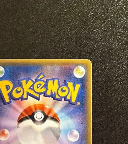 Pokemon Card Genshiguredonex UR XY Japanese version with slight white scuffing on back top edge